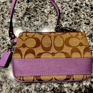 Small Coach wristlet. Perfect when you only need a few things!